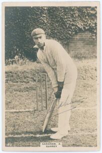 Andrew &lsquo;Andy&rsquo; Sandham. Surrey & England 1911-1937. Phillips &lsquo;Pinnace&rsquo; premium issue cabinet size sepia real photograph trade card of Sandham, full length in batting pose wearing Surrey cap. Signed in ink to the photograph by Sandham. No. 19.C. 4&rdquo;x6&rdquo;. Plai