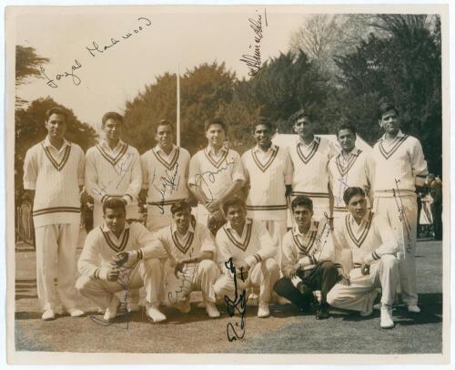 Pakistan tour to England 1962. Original mono press photograph of the Pakistan team wearing cricket attire, taken at Arundel for the opening match of the tour v Duke of Norfolk&rsquo;s XI, 28th April 1962. Signed to the photograph by eleven members of the Pakist