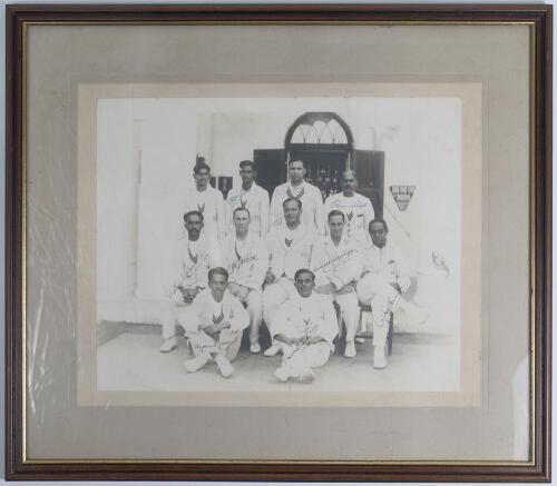Maharajkumar Kumar of Vizianagram&rsquo;s tour of India and Ceylon 1930/31. Rare and unusual large original mono photograph of the Maharaja&rsquo;s team seated and standing in rows wearing cricket attire and tour blazers. Probably taken at the match v Mysore at Banga