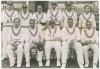India tour to England 1936. Original mono press photograph of the All India team seated and standing in rows in front of a pavilion, wearing cricket attire. Players featured are Maharajkumar of Vizianagram (Captain), Palia, Nayudu, Nissar, Merchant, Baqa 