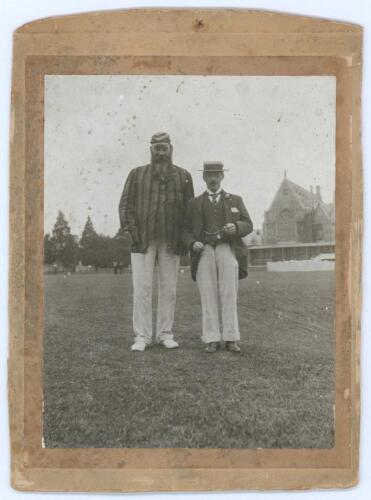 W.G. Grace and Bobby Abel. Original mono photograph of Grace and Abel standing together full length on the outfield, possibly at Cheltenham, c.1905, Grace wearing cap and blazer, Abel in straw boater and frock coat. The photograph measures 3.5&rdquo;x4.5&rdquo; laid 