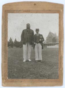 W.G. Grace and Bobby Abel. Original mono photograph of Grace and Abel standing together full length on the outfield, possibly at Cheltenham, c.1905, Grace wearing cap and blazer, Abel in straw boater and frock coat. The photograph measures 3.5&rdquo;x4.5&rdquo; laid 