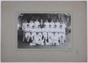 M.C.C. Tour of India 1933/34. Large rare official mono photograph of the M.C.C. team who toured India, seated and standing in rows and wearing cricket attire and tour caps. Players are Jardine (Captain), Walters, Elliott, Townsend, Nichols, Valentine, Gre