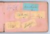 Cricket signatures 1950s. Autograph album comprising over sixty signatures. One page is fully signed in ink by all sixteen playing members of the South Africa touring party to England 1955. Signature are Cheetham (Captain), McGlew, Endean, Smith, Tayfield - 2