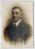 Arthur Owen Jones. Nottinghamshire & England 1892-1914. Excellent studio portrait of Jones, the M.C.C. Captain, taken on the M.C.C. tour of Australia in 1907/08. Jones is pictured wearing pin stripe suit and tie. The photograph nicely signed in black ink 