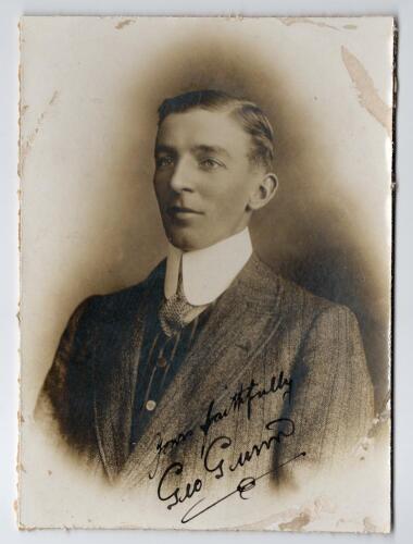 George Gunn. Nottinghamshire & England 1902-1932. Excellent studio portrait of Gunn taken on the M.C.C. tour of Australia in 1907/08. Gunn is pictured wearing suit and tie. The photograph nicely signed in black ink by Gunn &lsquo;yours faithfully&rsquo; to the image.