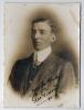 George Gunn. Nottinghamshire & England 1902-1932. Excellent studio portrait of Gunn taken on the M.C.C. tour of Australia in 1907/08. Gunn is pictured wearing suit and tie. The photograph nicely signed in black ink by Gunn &lsquo;yours faithfully&rsquo; to the image.
