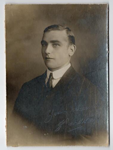 Joseph Hardstaff (Senior). Nottinghamshire & England, 1902-1924. Excellent studio portrait of Hardstaff taken on the M.C.C. tour of Australia in 1907/08. Hardstaff is pictured wearing suit and tie. The photograph nicely signed in black ink by Hardstaff &lsquo;y