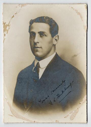 Kenneth Lotherington Hutchings. Kent & England 1902-1912. Excellent studio portrait of Hutchings taken on the M.C.C. tour of Australia in 1907/08. Hutchings is pictured wearing suit and tie. The photograph nicely signed in black ink by Hutchings &lsquo;yours si