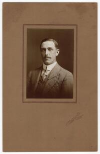Wilfred Rhodes. Yorkshire & England 1898-1930. Exquisite studio portrait of Rhodes taken on the M.C.C. 1911/12 tour of Australia. Rhodes is pictured wearing suit and tie. The photograph, laid down to official photographers mount, by T. Humphrey & Co, 264