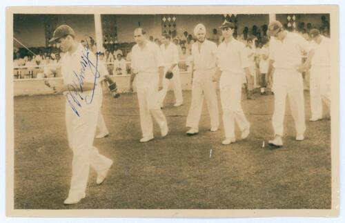 All Indian tour of Ceylon 1956. Mono photograph of Polly Umrigar leading out the Indian team on to the field. The photograph signed by Umrigar. The remainder of the team have signed the back of the photograph. Fifteen signatures including Manjrekar, Roy, 