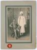 Kumar Shri Ranjitsinhji. Cambridge University, Sussex, London County & England 1893-1920. Original mono studio portrait photograph of Ranji as a boy, seated wearing a suit, with a servant(?) standing behind. The photograph by Vernon & Co of Bombay & Londo