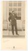 Kumar Shri Ranjitsinhji. Cambridge University, Sussex, London County & England 1893-1920. Excellent original sepia photograph of Ranjitsinhji, wearing suit and tie, with a cigarette in his left hand and leaning on a walking stick with cap to hand, The pho