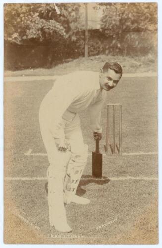 Kumar Shri Ranjitsinhji. Cambridge University, Sussex, London County & England 1893-1920. Early sepia real photograph postcard of Ranji full length at the wicket in unusual batting pose making his ground. Printed title &lsquo;Ranjitsinhji&rsquo;. E. Hawkins & Co. of 