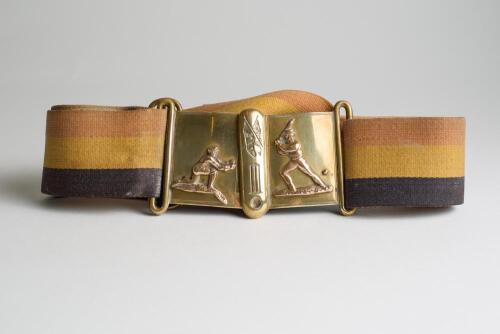 &lsquo;United All England XI&rsquo;. Early and complete material belt in colour bands of I&rsquo;Zingari with excellent two piece brass belt buckle with applied figures of a batsman about to strike the ball on one piece and a wicket-keeper ready to catch on the the other, 