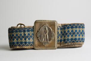 &lsquo;Batsman at the Wicket&rsquo;. Early and complete embroidered belt with oblong shaped brass belt buckle showing a batsman standing at the crease with the wicket behind him with floral decorative borders circa 1860/70&rsquo;s. The buckle measures 2.25&rdquo;x3&rdquo;. The belt wi