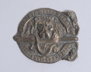 &lsquo;Strength holds the Bat, Wisdom guides the Ball&rsquo;. Early exquisite Victorian embossed circular brass belt buckle featuring a lion&rsquo;s head holding a bat in its teeth, intertwined in the design is a snake with a cricket ball between its teeth with the wording