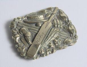 &lsquo;W.H. Fry&rsquo;. Early and exquisite Victorian embossed oblong brass belt buckle, with clasp and flat hook to back, depicting a cricket bat, boater, gloves, pads, stumps, cricket ball and boot with initial&rsquo;s engraved to the bat. Decorative floral borders. Appr