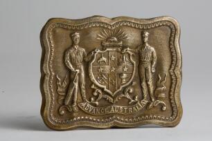 &lsquo;Advance Australia&rsquo;. Early exquisite Victorian embossed oblong brass belt buckle, with flat hook to back, featuring the Australian emblem to centre with a batsman and a bowler to either side with the wording &lsquo;Advance Australia&rsquo; beneath, decorative border 