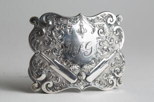 &lsquo;W.J.G.&rsquo;. Large exquisite Victorian oblong silver metal belt buckle, with clasp and flat hook to back, featuring the initials to centre with surrounding cricket bat, ball and floral c1870/80&rsquo;s. The buckle measures 3&rdquo;x2.25&rdquo; and is in good condition