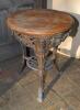 W.G. Grace. Original cast iron circular public house table with circular wooden top, supported by three legs, moulded with portrait busts of Grace wearing cricket cap to top of each leg with imprinted initials &lsquo;W.G&rsquo; above, and decorative pierced apron cen