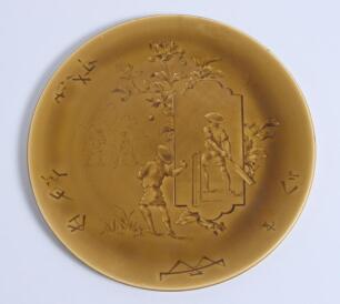 Cricket plate. A Rare Choisy Le-Roi Majolica mustard and green cricket plate depicting an Asian cricket match in the French Empire (Vietnam) with images of children (oriental) playing cricket to centre with foliage decoration and signed HB in chinese sign
