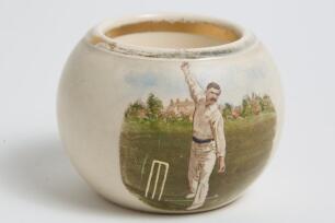 Thomas Richardson. Somerset, Surrey & England, 1892-1905. A stoneware circular match holder with transfer printed colour image of Richardson full length in bowling pose. Produced by Kepple of Bristol. Approx 2.5&rdquo; high. Registration number R319664 for 1898