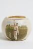 Thomas Richardson. Somerset, Surrey & England, 1892-1905. A stoneware circular match holder with transfer printed colour image of Richardson full length in bowling pose. Produced by Kepple of Bristol. Approx 2.5&rdquo; high. Registration number R319664 for 1898 - 2