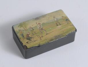 Cricket snuff box. Victorian papier mache oblong snuff box. The hinged lid painted with a colour cricketing scene, after Hayman&rsquo;s painting of 1740. The box measures approximately 3.25&rdquo; long, 2&rdquo; wide and 1&rdquo; deep. Some wear and chipping to the edges of the 