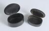 Cricket snuff boxes. An oval black lacquered papier mache snuff box with hinged lid, believed to be circa 1870&rsquo;s. The lid painted with a cricketing scene of boys playing cricket with trees in background. The box measures approx 2.75&rdquo; x 2&rdquo;x .1.25&rdquo; deep. So - 2
