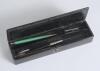 Cricket pencil case. A black lacquered papier mache oblong pencil case with hinged lid and lock to centre, believed to be circa 1870/80&rsquo;s. The lid painted with a comical cricketing scene of men playing cricket with tent and spectators to background. The c - 2