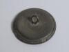 Cricket button. Very early cricket button, with figures of a batsman, under arm bowler and stumps within decorative circular border . Circa 1830/40&rsquo;s (?). Indistinct embossing to verso. G. Rare - 2