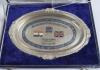 &lsquo;Malviya Cricket Club, New Delhi (India) tour to Surrey England 26 July- 8 Aug. 1999&rsquo;. Silver metal oval salver by S.R. Jain Jewellers, Delhi. Titles and flags to centre with decorative blue border. The salver unopened in original cellophane wrapper, cont - 2