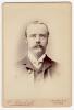 William Lloyd Murdoch. New South Wales, Sussex, London County & Australia 1875-1904. Excellent sepia cabinet card photograph of Murdoch, head and shoulders, in formal attire. Cabinet card by W.Blackhall of Oxford and measures 4.25&rdquo;x6.5&rdquo;. Very good/excelle