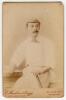 William Newham. Sussex & England 1881-1905. Good sepia cabinet card photograph of Newham, three quarter length, wearing cricket attire and cap holding a bat in his left hand. Appears to be signed in ink by Newham to verso. Cabinet card by E. Hawkins of Br