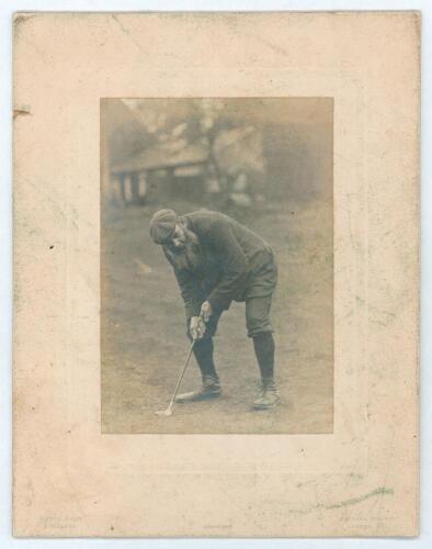 William Gilbert Grace. Gloucestershire & England, 1870-1899. Original cabinet photograph of W.G. Grace playing a golf stroke, wearing plus-fours and a flat cap. The cabinet card by Alfred Ellis & Walery of Baker Street, London. The card measures 7&rdquo;x9&rdquo;. So