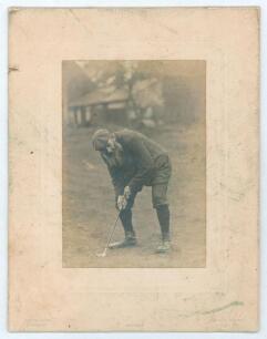 William Gilbert Grace. Gloucestershire & England, 1870-1899. Original cabinet photograph of W.G. Grace playing a golf stroke, wearing plus-fours and a flat cap. The cabinet card by Alfred Ellis & Walery of Baker Street, London. The card measures 7&rdquo;x9&rdquo;. So