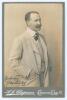 George Hillyard Swinstead. Artist, cricketer and writer. Excellent original sepia cabinet card photograph of Swinstead, three quarter length wearing suit and tie. Nicely signed in black ink to the lower left corner of the photograph &lsquo;Yours faithfully, G. 