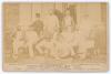 &lsquo;The Australian Cricketers 1882&rsquo;. Original cabinet card photograph of twelve members of the Australian touring party seated and standing in rows wearing caps and blazers. Printed title &lsquo;The Australian Cricketers 1886&rsquo; and players names printed to lower bo