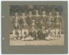 Australian Imperial Forces (A.I.F.) Cricket Team in England 1918 (1919). Original sepia photograph of the A.I.F. team seated and standing in rows wearing cricket attire, caps and blazers. Handwritten title in ink to lower edge of the photograph, &lsquo;Australi