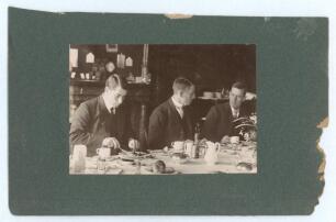 Australia circa 1905. Two original mono photographs, taken by Frank Laver who was a member and team Manager of the Australian 1905 tour of England, one of Victor Trumper, Warwick Armstrong and Clem Hill in shirts and ties sitting at a dining table eating 