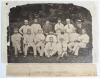 United South of England Cricket Team at Chichester 1871. Excellent rare, very early and large original mono photograph of fifteen members of the United South of England team seated and standing in rows wearing cricket attire and assorted caps for the matc