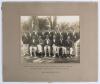 M.C.C. tour of South Africa 1922/23. Original sepia photograph of the M.C.C. touring team to South Africa 1922/23, standing and seated in rows wearing cricket attire and tour blazers, some in caps. Players featured are Mann (Captain), Gilligan, Fender, Ca
