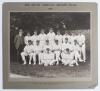 &lsquo;The South African Cricket Team 1924&rsquo;. Large and impressive sepia photograph of the South African touring team to England in 1924, seated and standing in rows, wearing cricket attire and tour caps. The photograph is laid down to official photographers mou