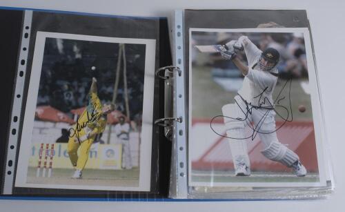 Australia 1990s onwards. Blue binder comprising a good selection of eighty colour and mono press photographs and magazine extracts featuring Australian players. Thirteen are signed by the featured player. Signatures include Shane Warne, Tom Moody, Justin 