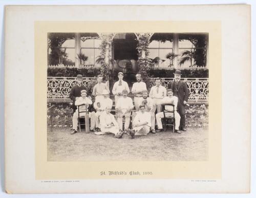 &lsquo;St. Wilfrids Club, 1886&rsquo;. Early original sepia photograph of the S. Wilfrids team, seated and standing in rows, wearing cricket attire in front of the pavilion at Sheffield Park, Sussex, who played the Sheffield Park team on the 25th August 1886. No reco