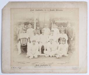 &lsquo;Lord Sheffield&rsquo;s XI v. South Africans&rsquo; 1894. Early and large original sepia photograph of Lord Sheffield&rsquo;s team who played the South Africans at Sheffield Park, East Sussex on the 22nd & 23rd May 1894, the players seated and standing in rows wearing caps