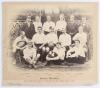 &lsquo;Sussex Martlets&rsquo; 1894. Early original sepia photograph of the Sussex Martlets football team seated and standing in rows in front of the pavilion wearing football attire for the match v Nottingham Forest hosted by the Earl of Sheffield at Sheffield Park, 