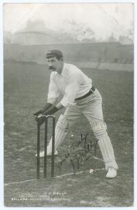 James Joseph Kelly. New South Wales & Australia 1894-1907. Early original mono postcard of Kelly in wicket-keeping pose wearing Australian Test cap. Printed title &lsquo;J.J. Kelly&rsquo;. Nicely signed in black ink to the image &lsquo;Yours truly, J.J. Kelly&rsquo;. T. Bolland,
