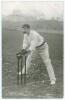 James Joseph Kelly. New South Wales & Australia 1894-1907. Early original mono postcard of Kelly in wicket-keeping pose wearing Australian Test cap. Printed title &lsquo;J.J. Kelly&rsquo;. Nicely signed in black ink to the image &lsquo;Yours truly, J.J. Kelly&rsquo;. T. Bolland,